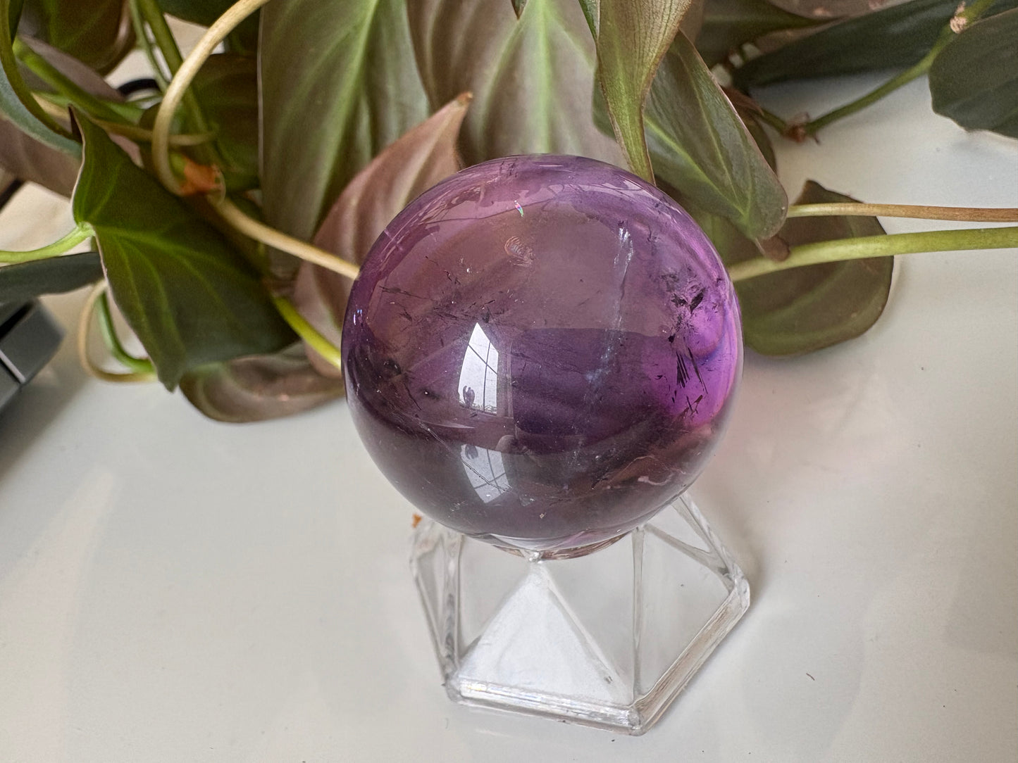 Amethyst Sphere with Black Tourmaline Inclusions